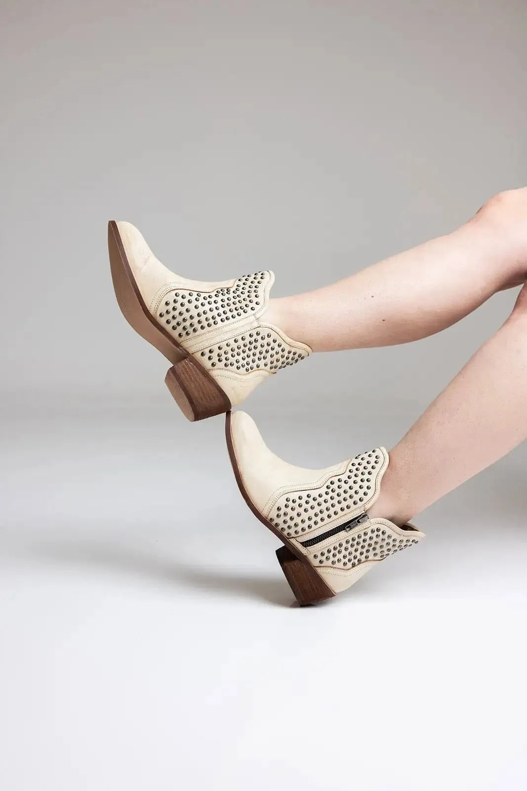 Black Hued Leather Studded Ankle Boot
