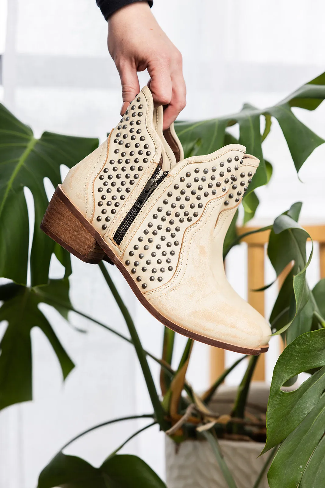 Black Hued Leather Studded Ankle Boot