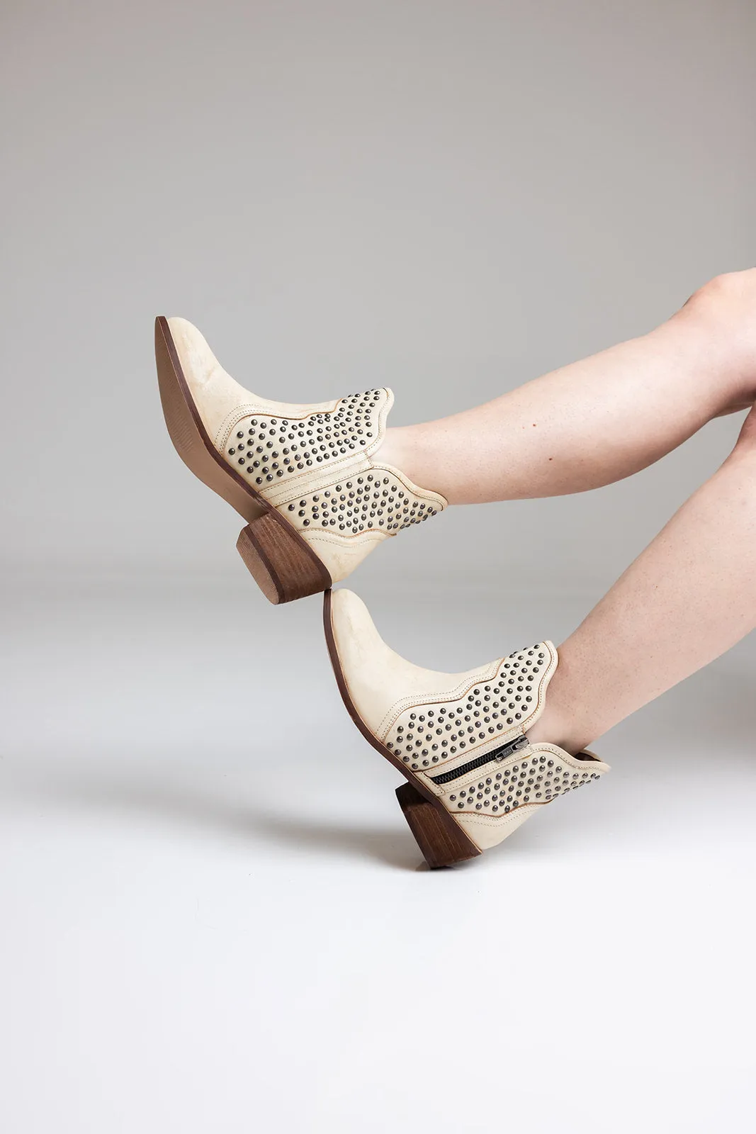 Black Hued Leather Studded Ankle Boot